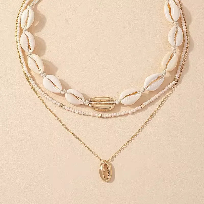 featuring natural shells and a unique, earthy design, perfect for adding a beach-inspired touch to your outfit, ideal for casual wear, summer vacations, or creating a relaxed boho look 